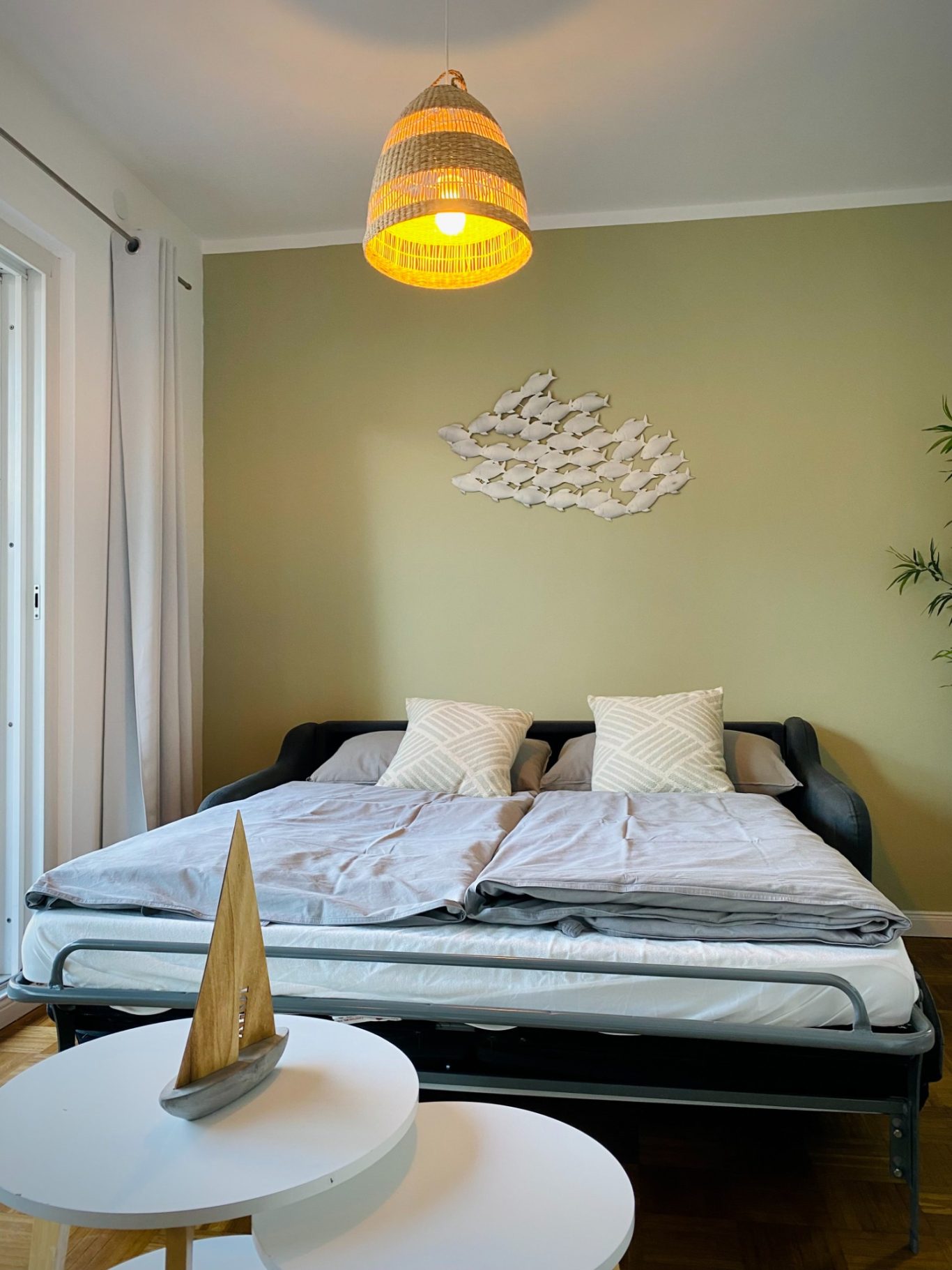 Schlafsofa für zusätzliche Gäste Ausziehbares Schlafsofa im Wohnbereich der Ferienwohnung Sandkorn in Sierksdorf